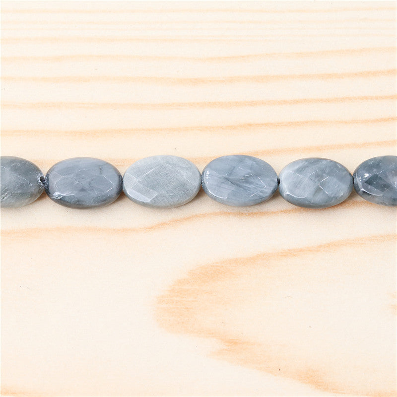 Натуральные бусины "Орлиные глаза" овальные граненые 10х14мм отв. 1мм примерно 28шт длина 39см