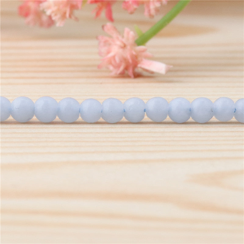 ナチュラルブルーエンジェライトビーズ ラウンド形 4mm 穴長径 0.8mm 約113個 39cm ストランド