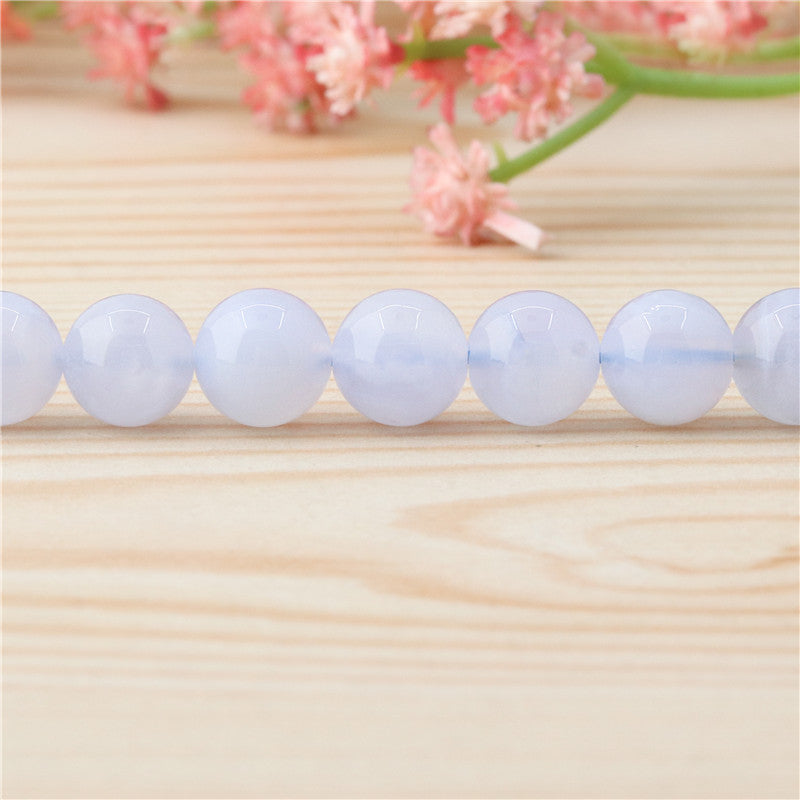 Бусины из натурального синего халцедона круглые 8мм отв. 1мм примерно 50шт длина 39см