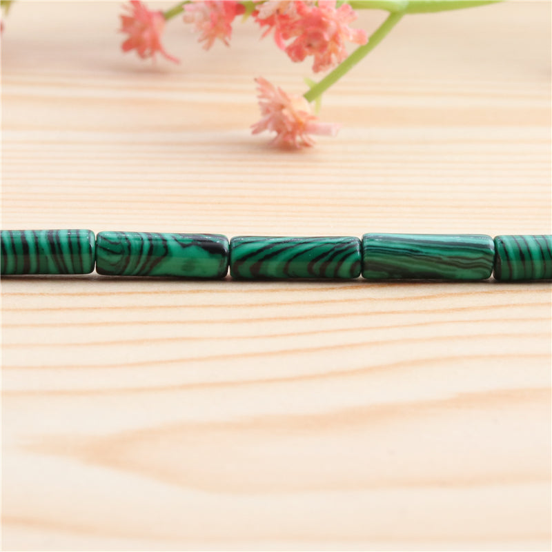 Малахитовые бусины трубка 4х13мм отв. 1мм примерно 29шт длина 39см