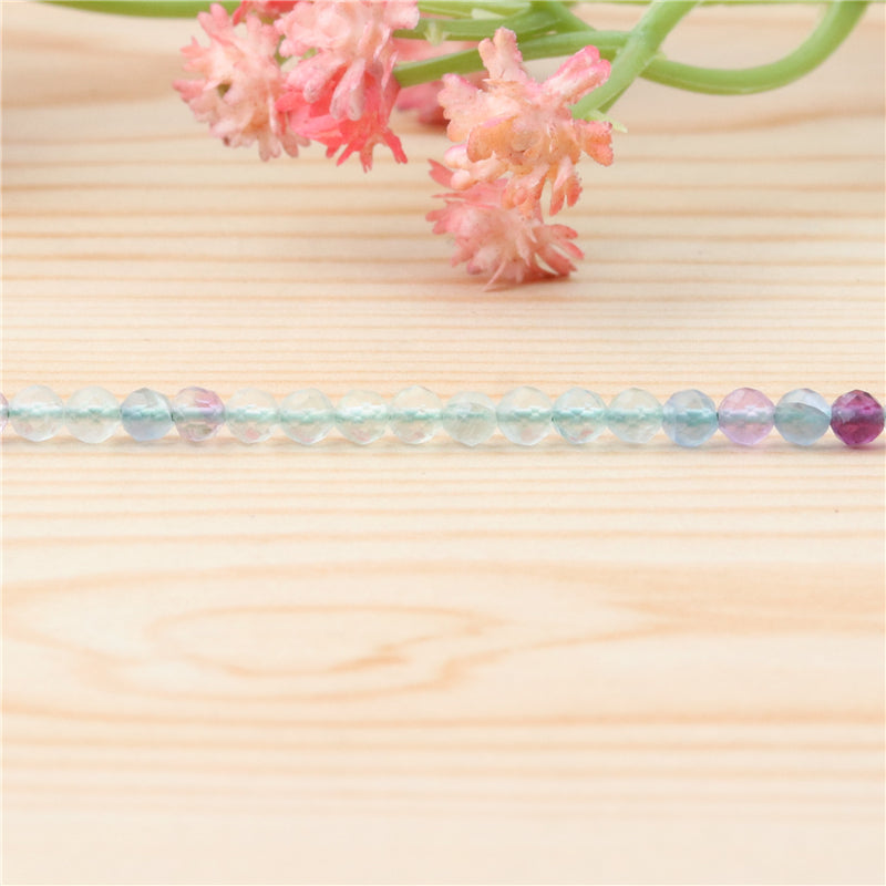 Бусины из натурального флюорита круглые граненые диаметр 4мм отв. 0.6мм примерно 102шт длина 39см