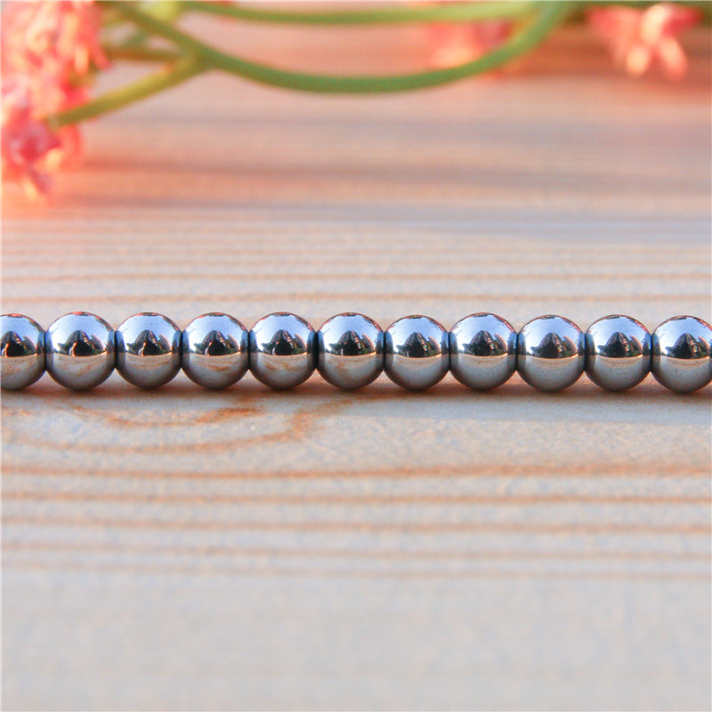 Perles argent hématite naturelle ronde 8mm trou 1mm environ 50pcs sur fil 39cm