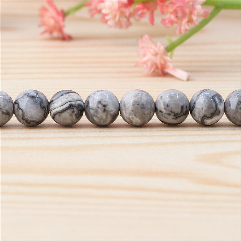 Perles photo gris naturel rondes 6mm trou 0.8mm environ 65pcs 39cm sur fil