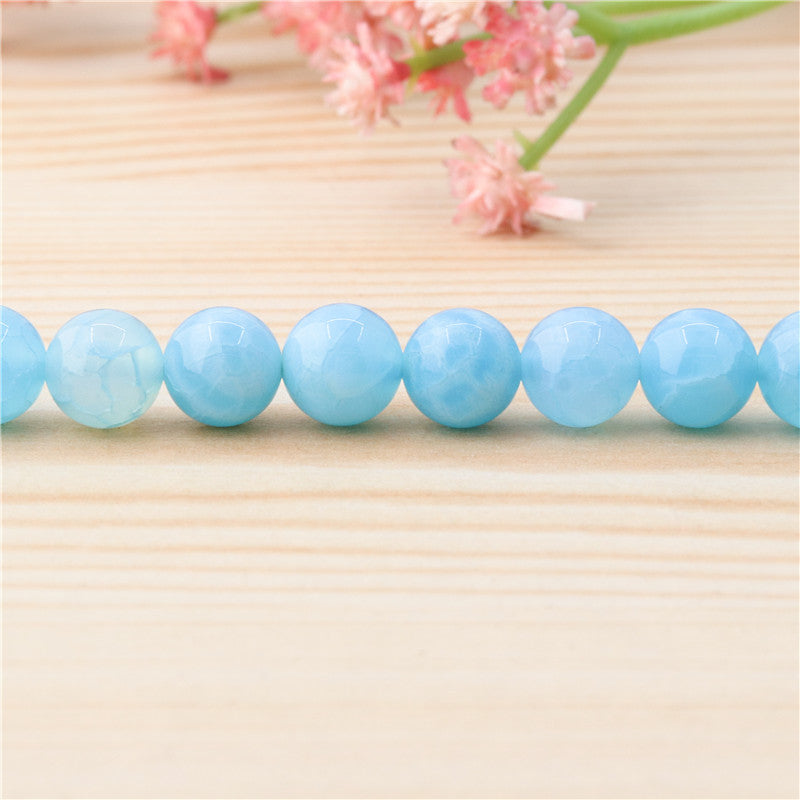 Perles calcédoine bleue texture naturelle rondes trou 8mm 1mm environ 50pcs 39cm sur fil