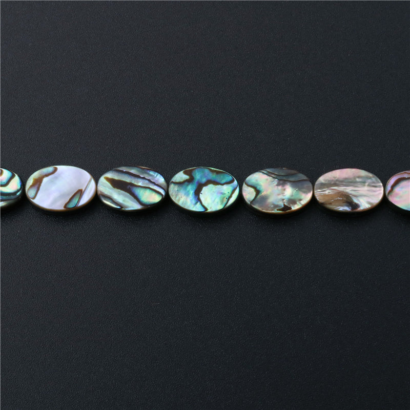 Perline di conchiglia di abalone naturale, piatte, ovali, 12x16 mm, foro da 1 mm, circa 25 pezzi, filo da 39 cm.