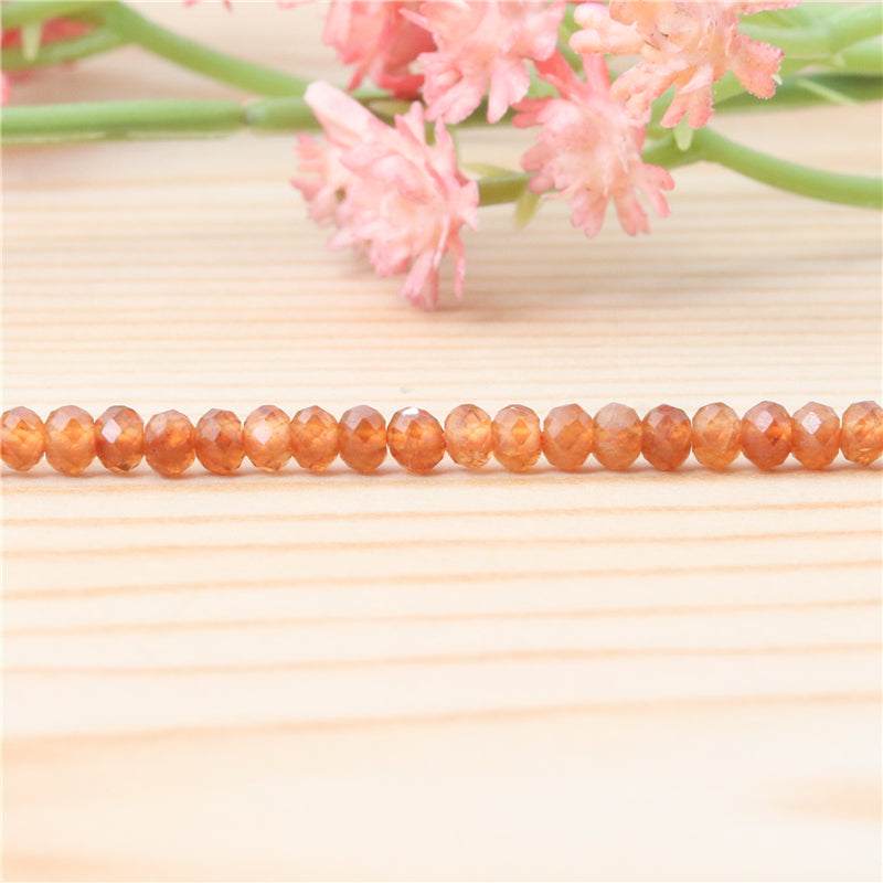 Perles de grenat orange naturel boulier facette 3x4mm trou 0.6mm environ 136pcs 39cm sur fil