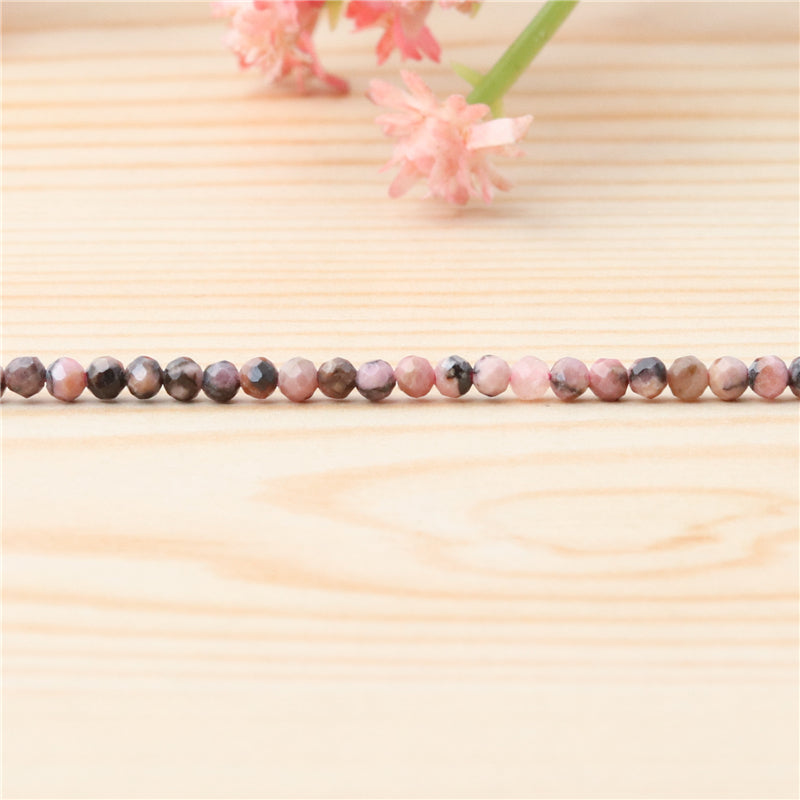 Perles Rhodochrosite noire naturelle ronde facette trou 2mm trou 0.5mm environ 174pcs 39cm sur fil