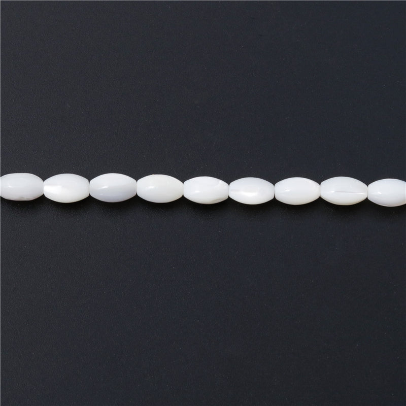 Perles de nacre naturelle forme tonneau 6x9mm trou 0.8mm environ 45pcs 39cm sur fil