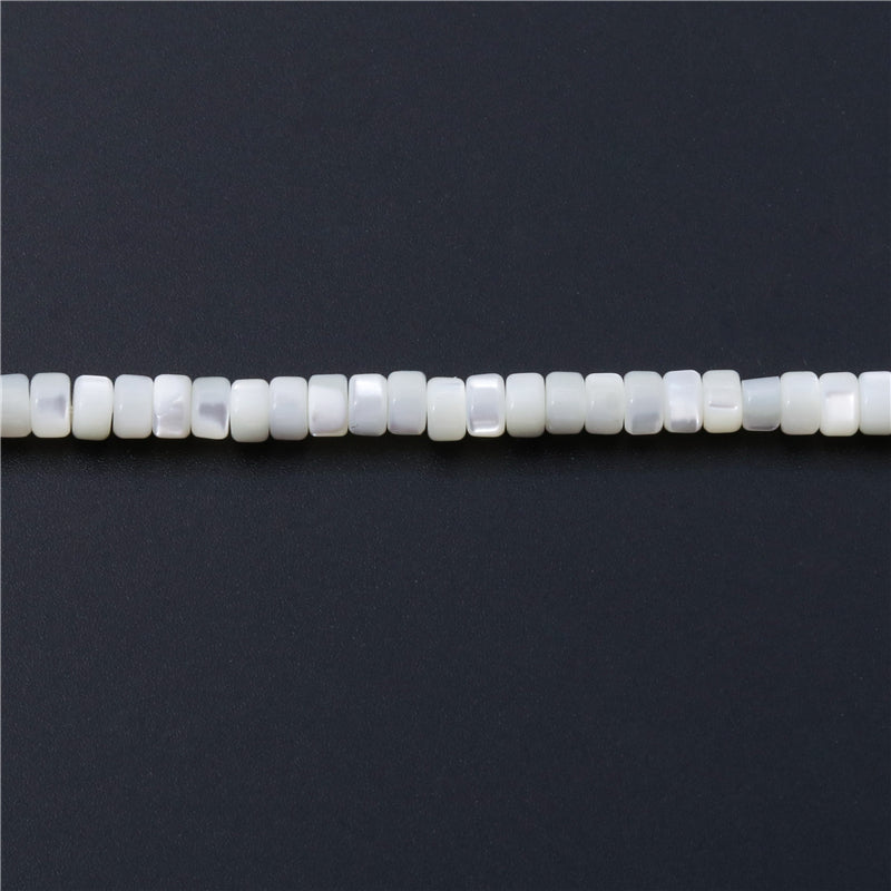 Perles de nacre naturelle Heishi 3x5mm trou 0.8mm environ 128 pièces sur fil de 39cm